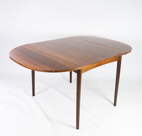Spisebord med udtræk i palisander designet af Arne Vodder fra 1960erne. 
