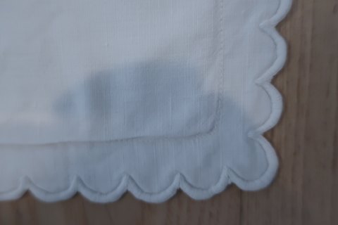 An antique pillow cover/pillow slipA beautiful old pillow cover with handmade white embroidery and with   old white buttons made of fabric67cm x 67cmThe antique, Danish linen and fustian is our speciality