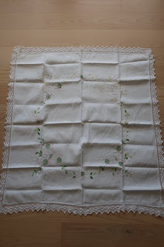 Old table clothWith embroidery in colours - made by handAbout 103cm x 95cmIn a good condition