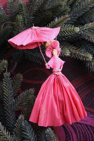 Old Christmas tree ornament, nice lady with umbrella made of colored crepe 
paper...