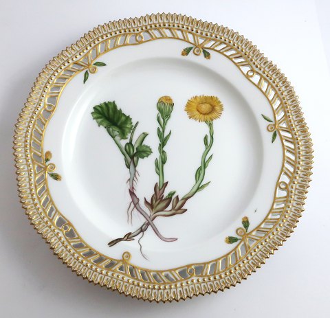 Royal Copenhagen Flora Danica. Lunch plate with open-work border. Design # 3554. Diameter 23 cm. (1 quality). Tussilago farfara L
