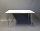 Rectangular dining table by Piet Hein, Arne Jacobsen, Bruno Mathsson and Fritz 
Hansen.
