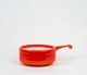 Red glass bowl with handle and white opaline glass on the inside from the Palet 
series by Michael Bang for Holmegaard.
5000m2 showroom
