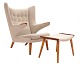 Hans J. Wegner “Papa Bear”. Wingback teak and oak easy chair with matching stool. AP 19 and AP 29