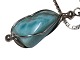 Green Larimer stone in silver mounting with silver 
necklace