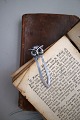 Antique bookmark, owl in silver (stamped 830) with eyes in green stones.