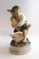 Royal Copenhagen. Porcelænsfigur. Gåsetyven. Model 2139. Højde 17 cm. (3 
sortering)