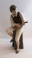 Bing & Gröndahl. Porcelain figure. Mandolin player. Model 1600. Height 28.5 cm. 
(1 quality).