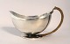 Georg Jensen. Saucenæb / sovseskål med håndtag. Harald Nielsen. Model 761. 
Længde 17 cm. Højde 7,5 cm.  Produceret 1933 - 1945