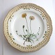 Lundin Antique presents: Royal Copenhagen. Flora Danica plate w. open-work border. Diameter 25 cm. Model 3553. ...