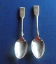 Pair of children's spoons in English sterling silver. ...