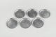 Just Andersen, sæt af seks glasbakker i tin med københavnermotiver.