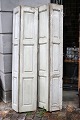 K&Co. presents: A pair of decorative old French shutters with original light grey patinated colour...