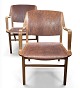 Et par flotte Axe-stole i teak og bøg af Peter Hvidt & Orla Mølgaard for Fritz Hansen, Danmark, 1950. flot patina. Prisen er for parret.Levering:Jylland/Fyn(månedsvis) 500krSjælland(ugentlig) 300kr16.800,- DKK pr. stk.