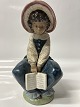 Lladro, Spansk figur: Pige med bog.Højde 21,5 cm.