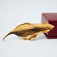 A. Michelsen, Gertrud Engel; Broche af 14 kt. guld