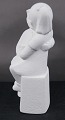 Stone Art hvid figur fra Marbell, Nederlandene. Søskendepar på bænk.