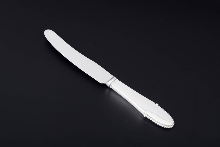 Georg JensenFruit knife in the “beaded” pattern.Sterling silver handle and stainless steel blade.