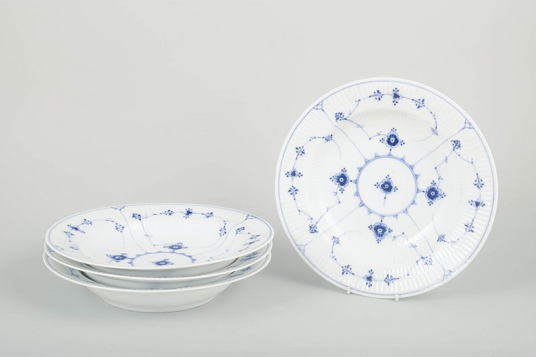 Royal CopenhagenBlue Fluted plain, model 1/165Set of four deep plates, 1920s.
