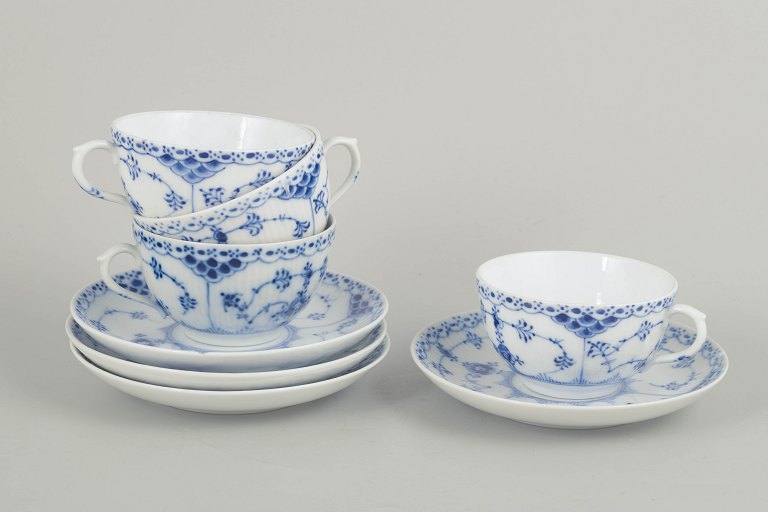 Royal Copenhagen blue fluted half laceSet of 4 chocolate cups and saucers.