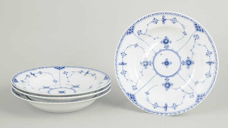 Royal Copenhagen Blue Fluted Half Lace set of four soup plates.