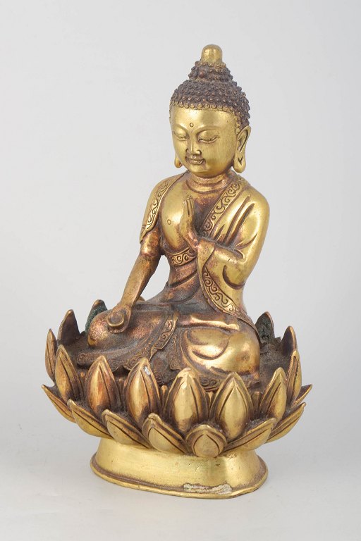 Buddhafigur i forgyldt bronze.